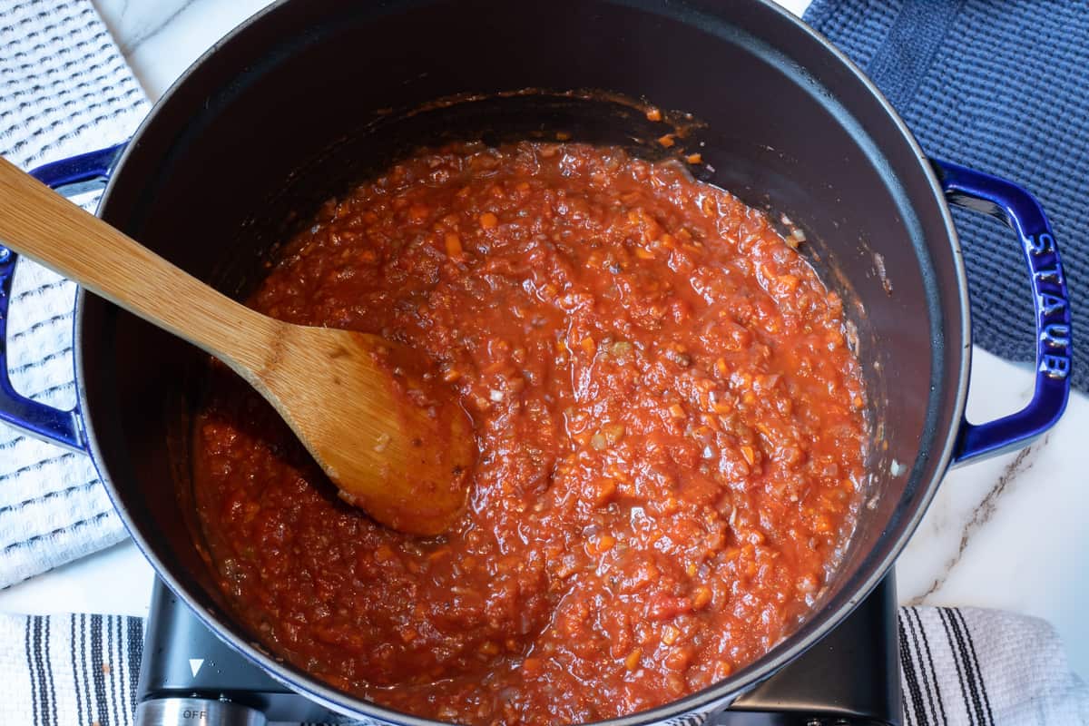 Spaghetti with meat sauce deglaze add marinara